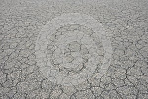 Texture of dried gray mud, dried earth