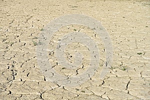 Texture of dry land in southern Europe. Global warming and greenhouse effect. photo