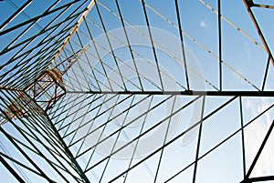 Texture of an electric pylon and the blue sky