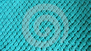 Texture of embossed turquoise handmade plaid closeup background photo