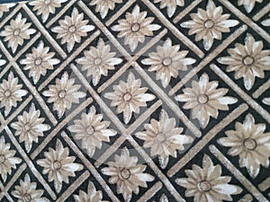 TEXTURE FABRIC IN BROWN TONES WITH FLORAL PATTERNS