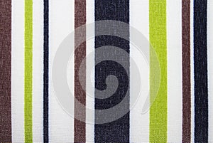 The texture of the fabric in multi-colored stripes.