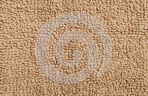 Texture of a fleecy carpet of beige color