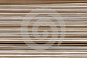 Texture in the form of a stack of cardboard beige