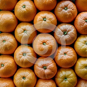 Texture of fresh mandarin oranges in supermarket, citrus fruit photo