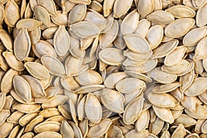 Texture of fresh pumpkin seeds. Tasty and healthy food_