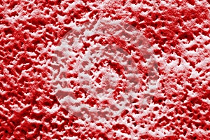 Texture of friable red snow