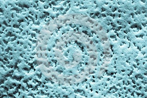 Texture of friable turquoise snow