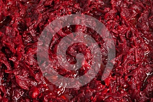 Texture of fried or stewed beetroot, close-up, top view. Food background