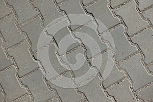 Texture of gray concrete dumble pavement