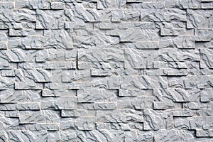 Texture gray decorative wall with corrugated surface