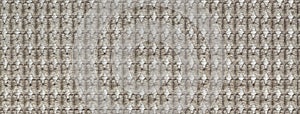 Texture of gray fluffy fabric background with rhomboid pattern, macro. Abstract backdrop