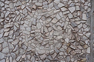 Texture of gray gravel pebble dash