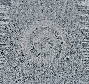 Texture. Gray heterogeneous stone with potholes. uneven surface, rough surface