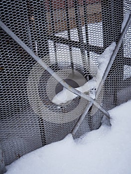 Texture of a gray metal grate with various elements