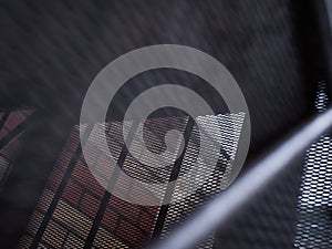 Texture of a gray metal grate with various elements