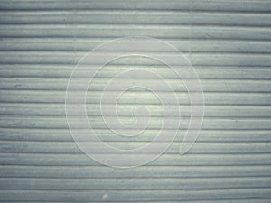 Texture: Gray plastic with horizontal stripes, vintage style, used as a background and wallpaper