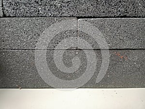 Texture of Gray Stone Wall Backgrounds. On a granite floor