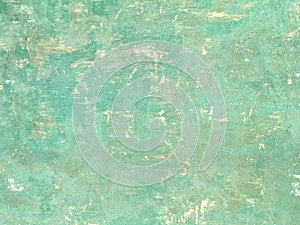 Texture of a green old shabby wooden background. Structure of a vintage turquoise painted coating of wood.
