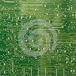 Texture of green printed wiring board PWB. Designed for electrical and mechanical connection of various electronic components of