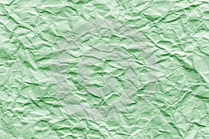 Texture of green wrinkled paper