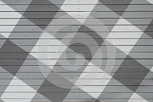 texture of grey boards. wide stripes criss-cross, pattern square, rhombus. background, wooden planks