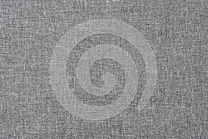 Texture of grey canvas fabric. Gray linen cloth background