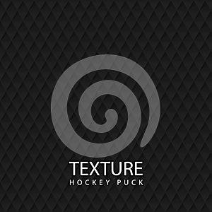 Texture ice hockey puck. Black background