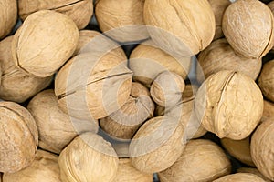 Texture of inshell walnuts close-up
