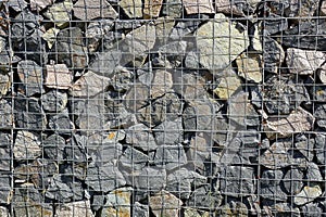 Texture of the iron stack and stones in the wall