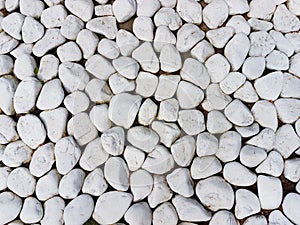 Texture: large sanded gravel. Small white chalk stones. Artistic reliefs from natural objects.