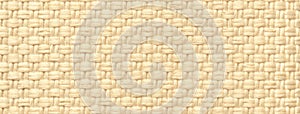 Texture of light beige color background from woven textile material with wicker pattern, macro