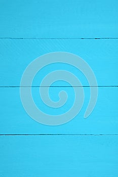 Texture of light blue wooden surface as background, closeup