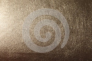 Texture of light brown leather as background, closeup