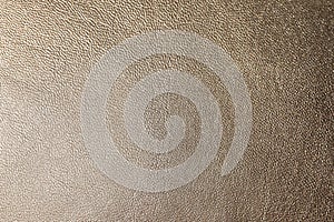 Texture of light brown leather as background