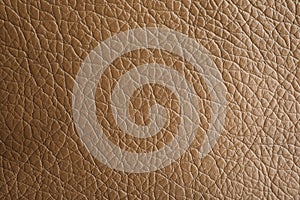 Texture of light brown leather as background, closeup