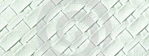 Texture of light green leather background with wicker pattern, macro. Abstract cyan backdrop