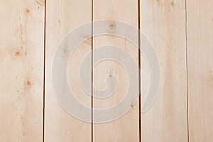 Texture of light wooden boards. Vertical view.