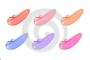 Texture of the lipstick of different colors isolated on white background. Set of multicolored strokes. Cosmetic product