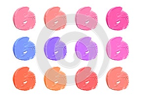 Texture of the lipstick of different colors isolated on white background. Set of multicolored strokes. Cosmetic product..