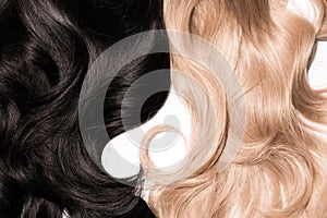 Texture of the long healthy Hair wavy dark Brown and blond