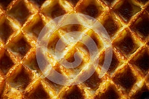 The texture is lush fresh Belgian waffles. Close