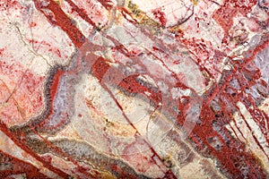 Texture macro of dark and light red jasper