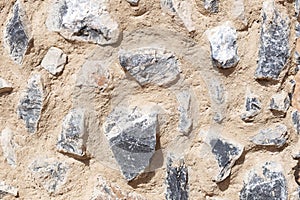 Texture made of large stones in mortar. Horizontal