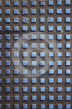 Texture of metal plate with embossed square patterns