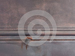 Texture metallic garage door gate with red infernal color