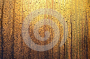 The texture of misted glass with a lot of drops and drips of con