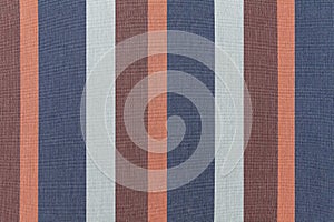 texture with multi-colored stripes. Colored embroidery pattern and background seamless
