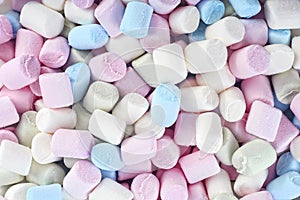 Texture of multi-colored sweet marshmallows.