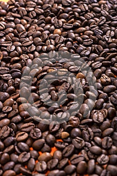 Texture of natural coffee beans. International Coffee Day concept. October 1st